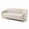 Canapé 3 places en tissu bouclé beige avec pieds en bois