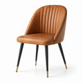 Chaise en cuir synthétique brun avec pieds en métal noir et embouts dorés